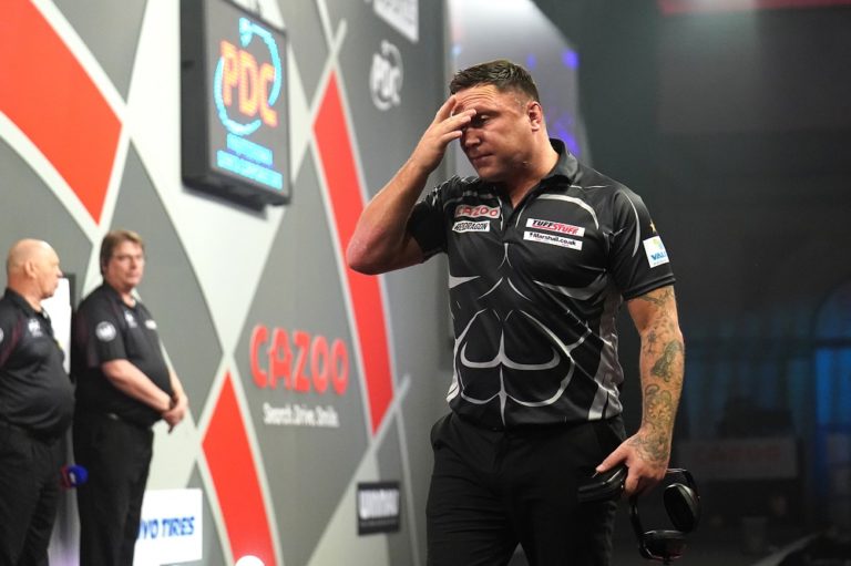 Gerwyn Price crashes out of World Championships after donning ear