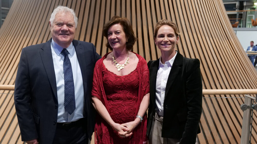 First Minister Eluned Morgan with Max Boyce and Jess Fishlock